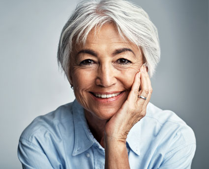 Woman Smiling with Dental Implants