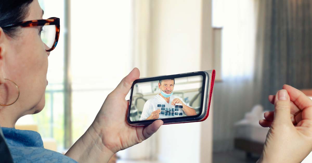 Women Having Virtual Dental Consult on Phone